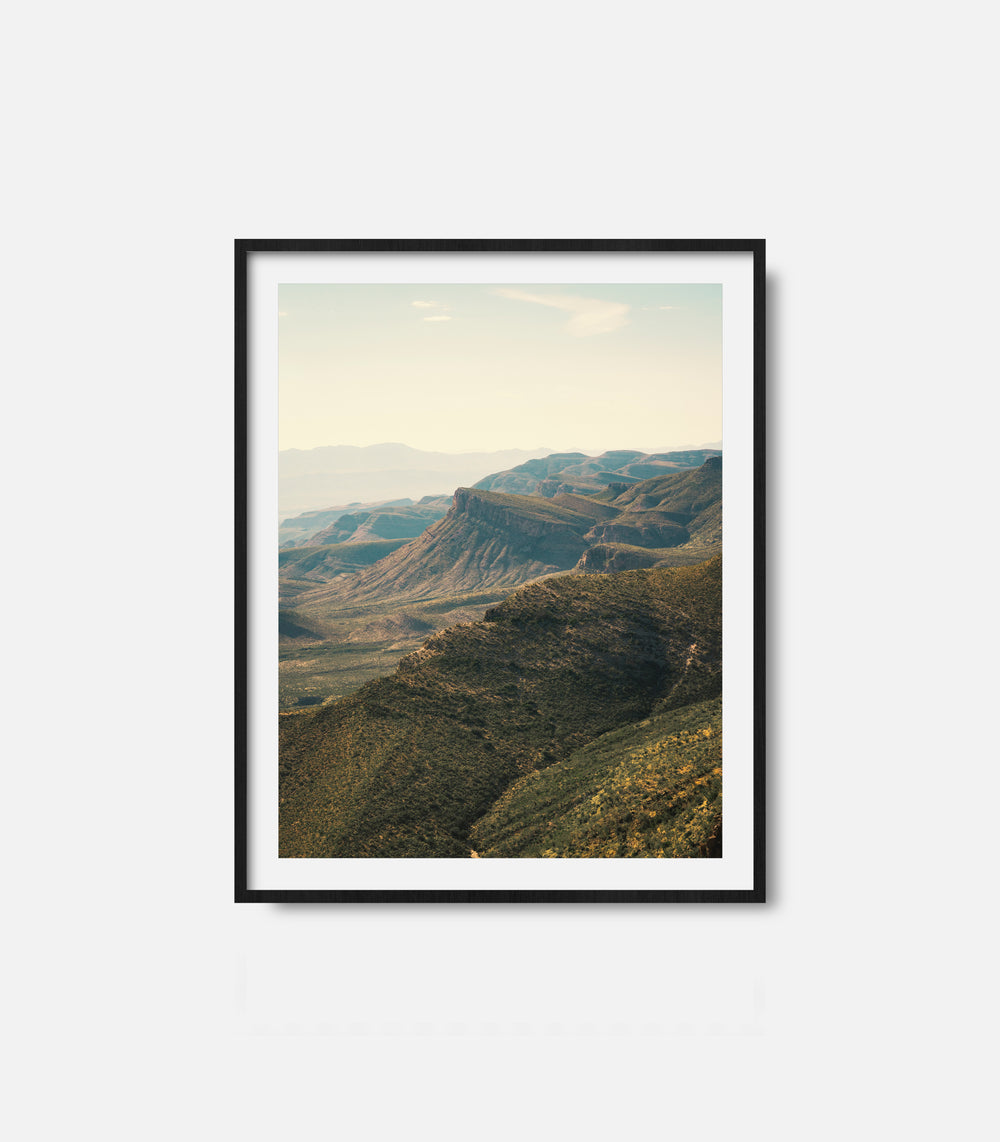 Framed mountain landscape wall art with layered desert hills