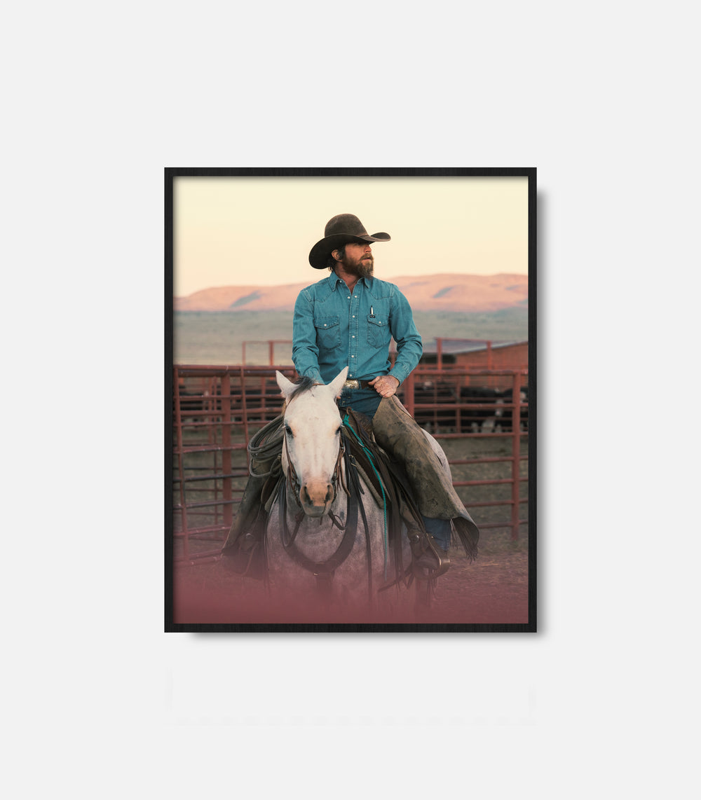 Western wall art of cowboy on horseback in framed print, rustic interior decor