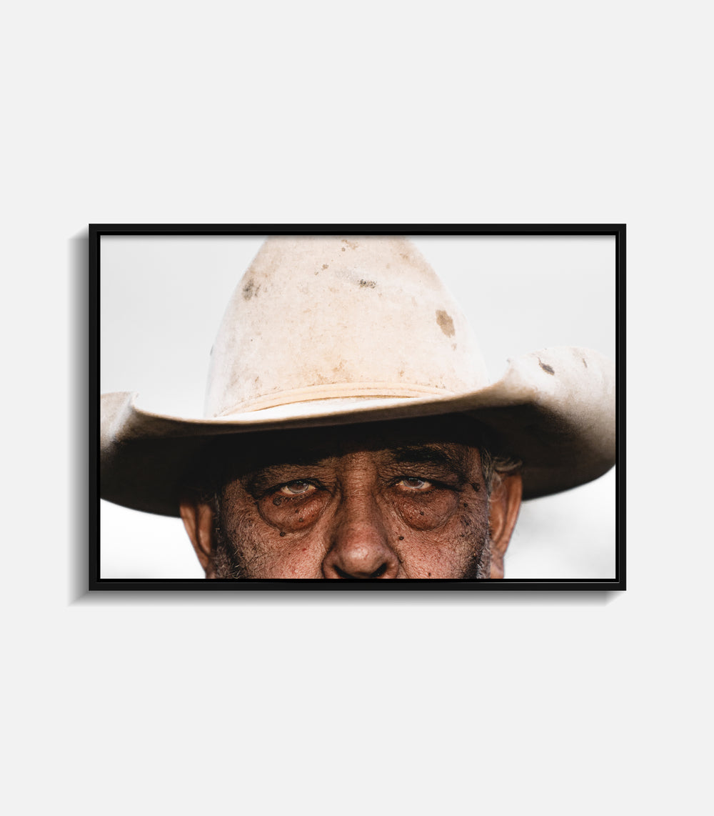 Western portrait wall art print of man in hat, clean minimal framed decor