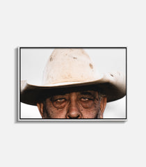 Portrait wall art of man wearing cowboy hat, framed western style decor