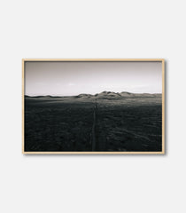 Minimalist monochrome landscape print with open terrain