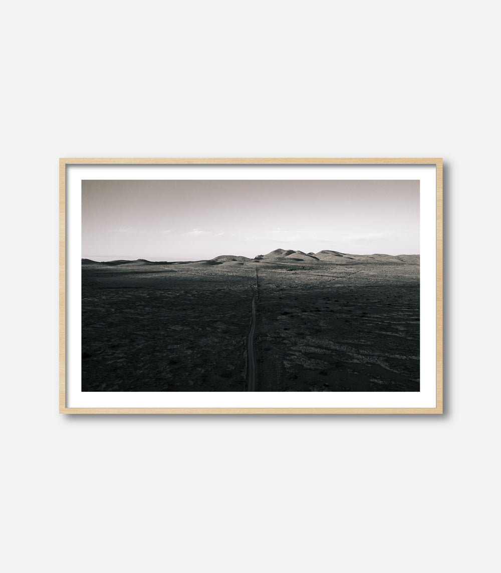 Framed panoramic desert photography in black and white