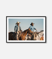 Framed cowboy wall art featuring two riders on horseback, rustic western decor